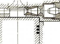 Schematick vkres dvojit komrky v hlav vlc systmu Lanova, kde je vidt umstn vstikovac trysky pesn proti otvoru vstupnho kanlku komrky.